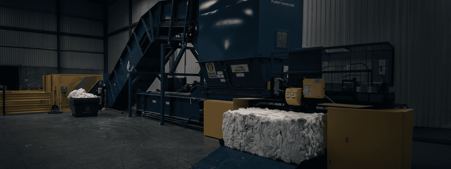 Baler infeed conveyors built around your equipment, material, and layout